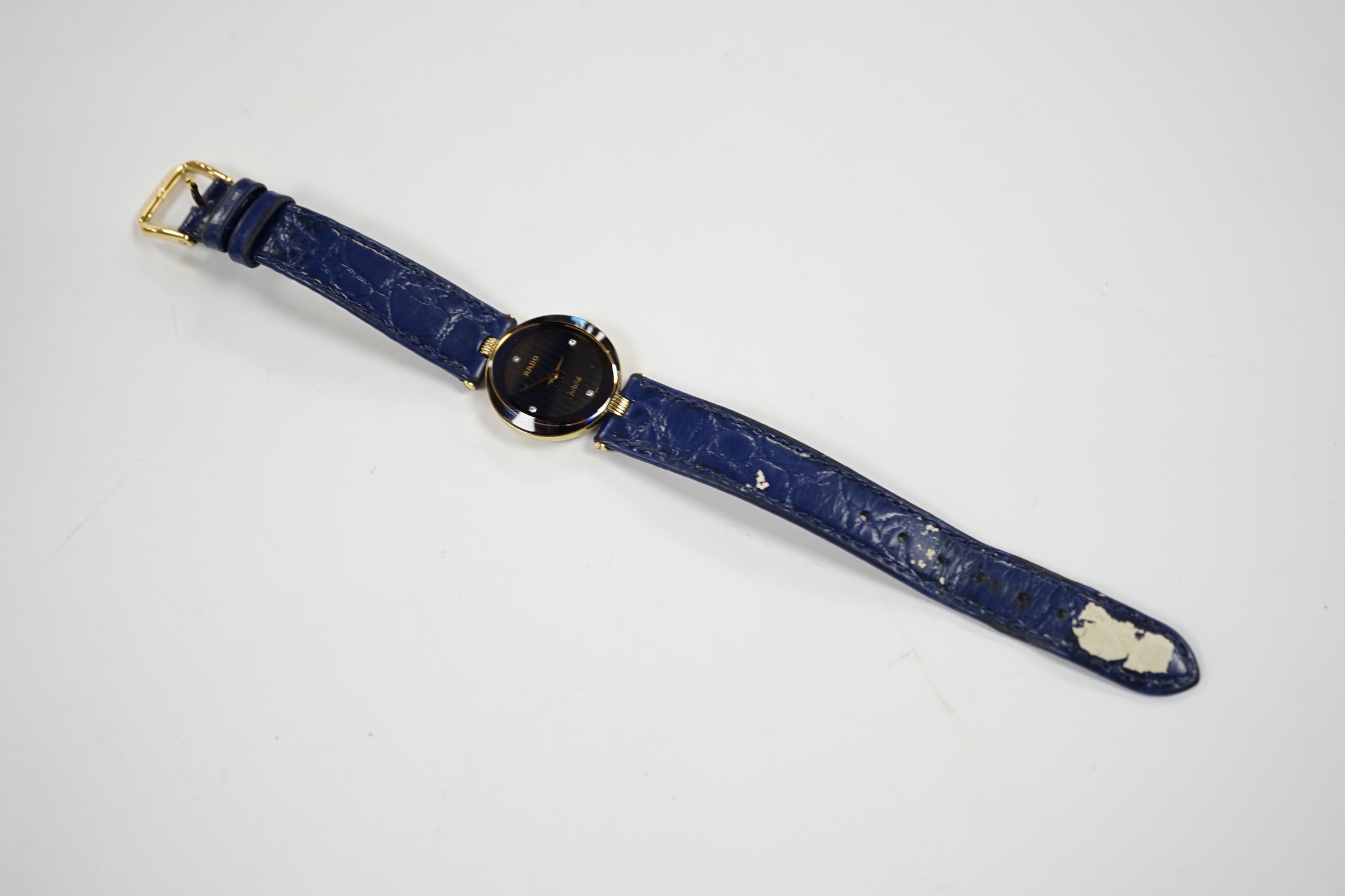 A lady's modern steel and gold plated Rado Jubilé quartz wrist watch, Rado strap and spare black Rado strap, with Rado box.
